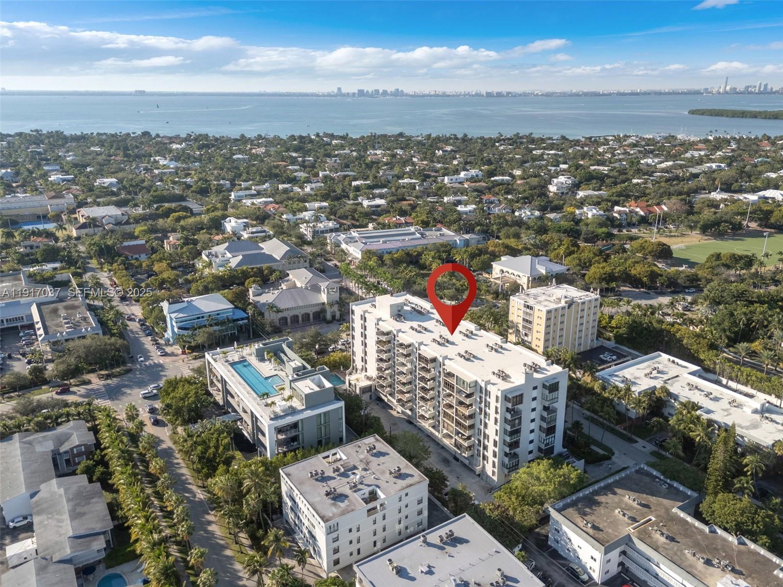 575 Crandon Boulevard, Unit 504 Key Biscayne, FL 33149 - Photo 43 of 46 an aerial view of city and ocean