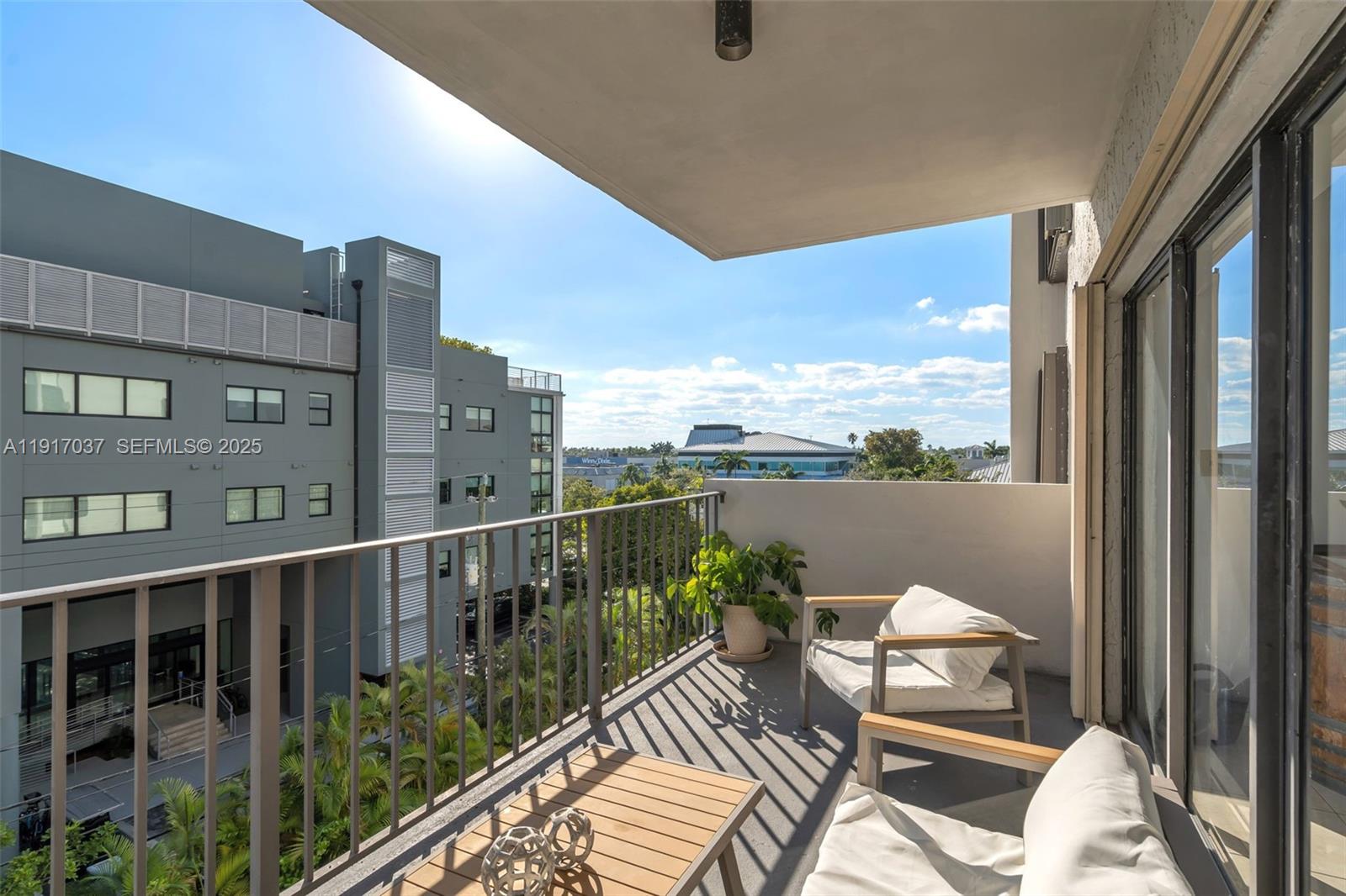 575 Crandon Boulevard, Unit 504 Key Biscayne, FL 33149 - Photo 6 of 46 a view of balcony with furniture
