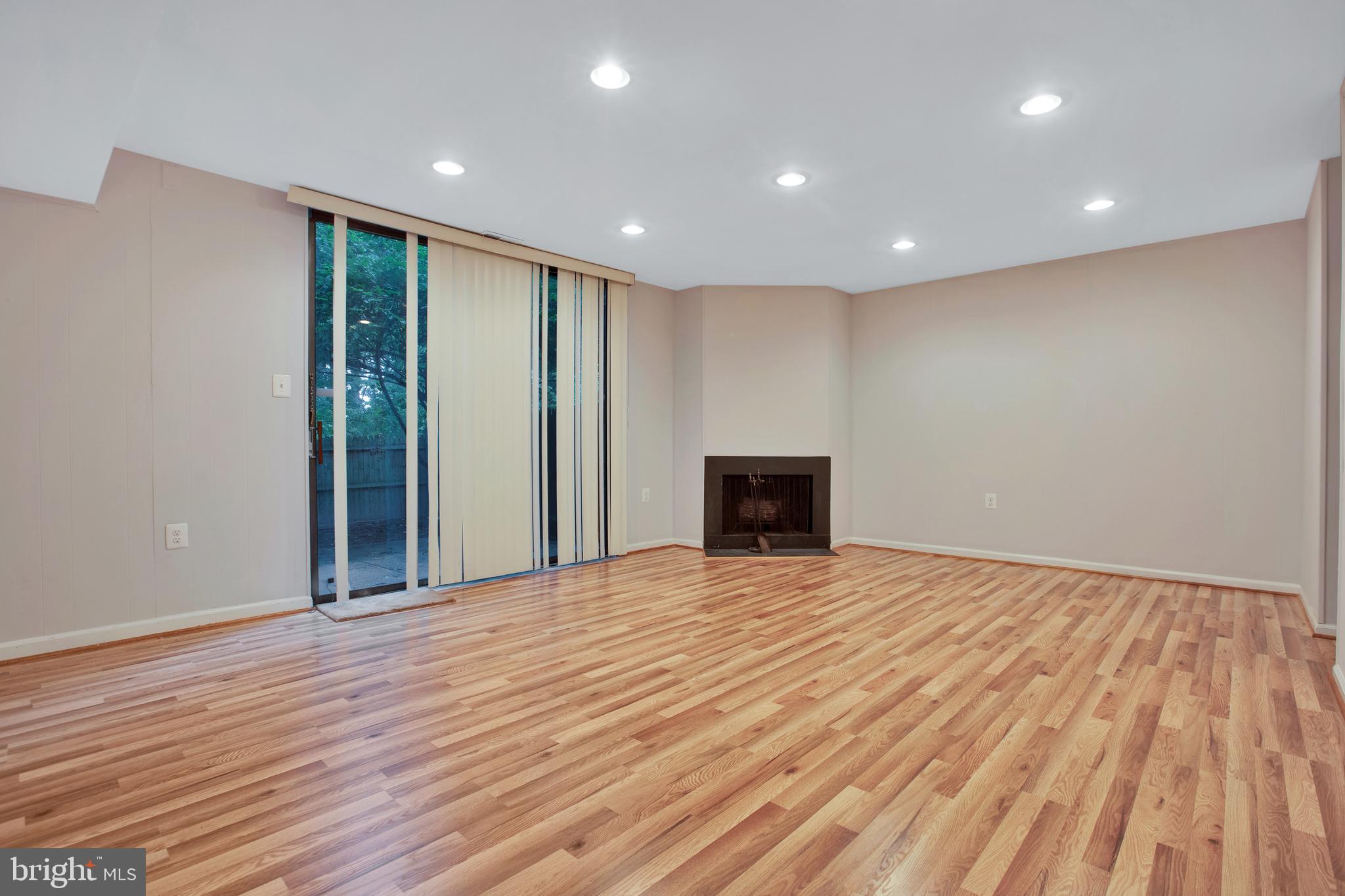8014 Inverness Ridge Road Rockville, MD 20854 - Photo 11 of 35 Family room with wood burning fireplace