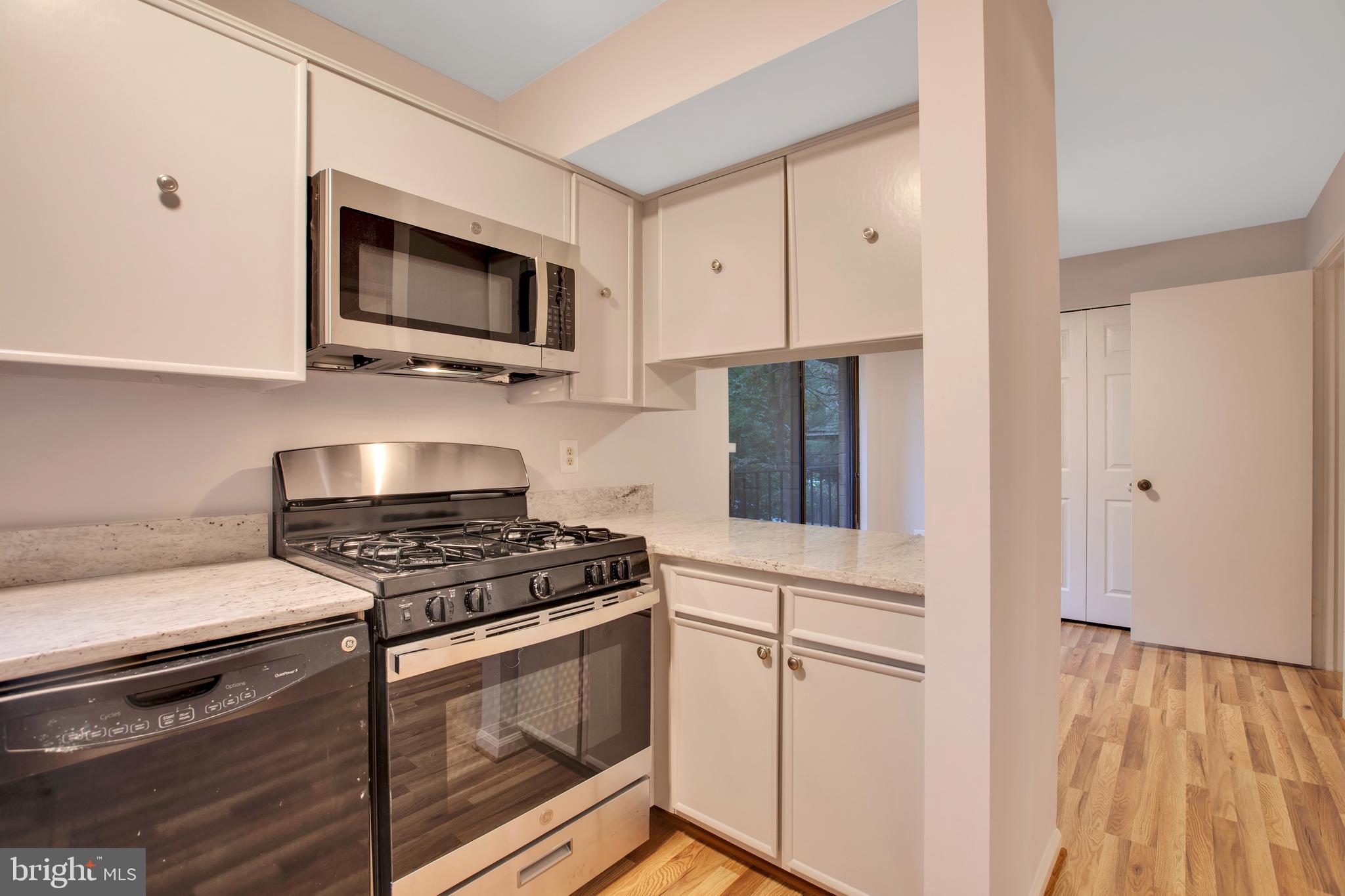 8014 Inverness Ridge Road Rockville, MD 20854 - Photo 15 of 35 Kitchen opens onto breakfast area