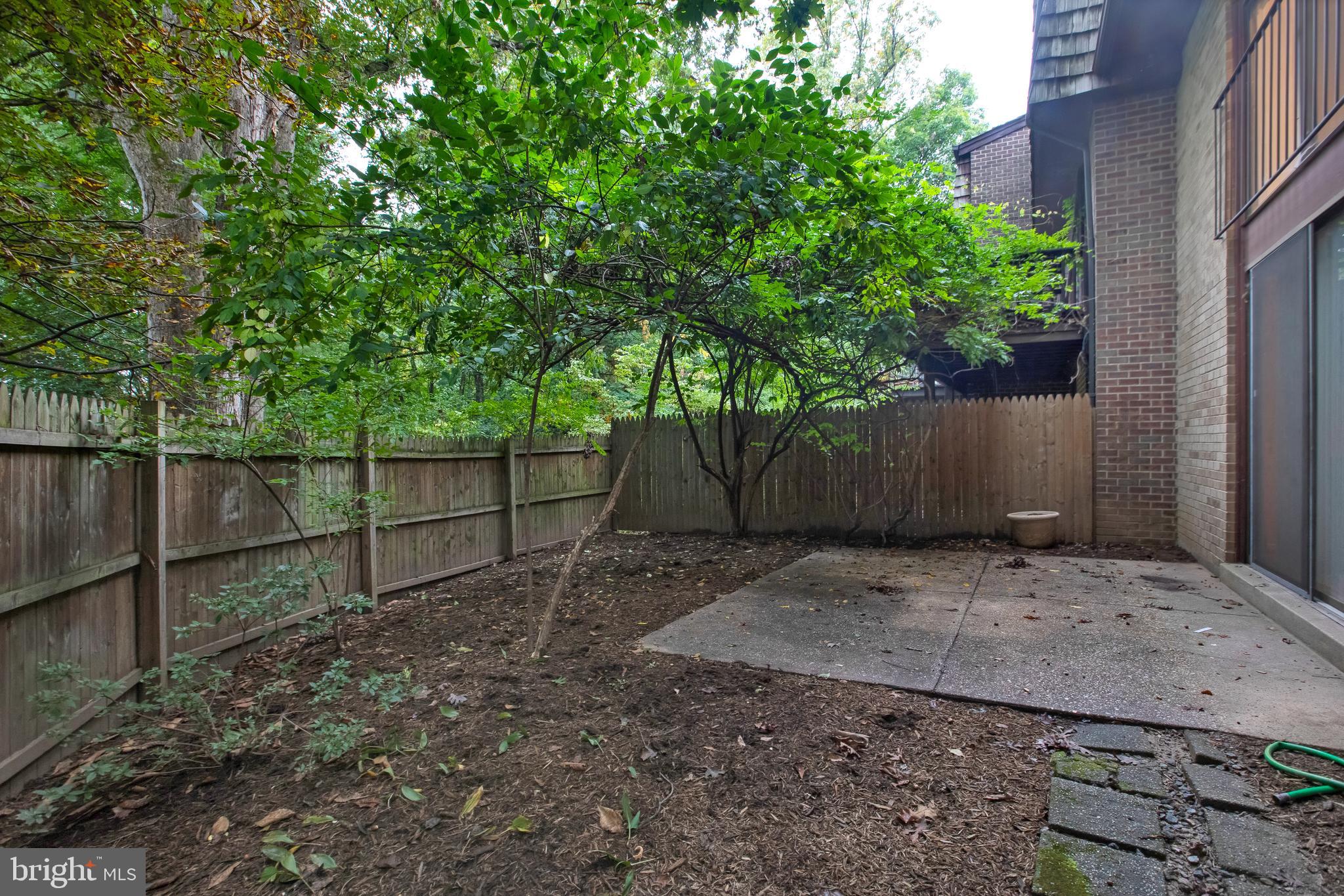8014 Inverness Ridge Road Rockville, MD 20854 - Photo 4 of 35 Fenced yard with patio