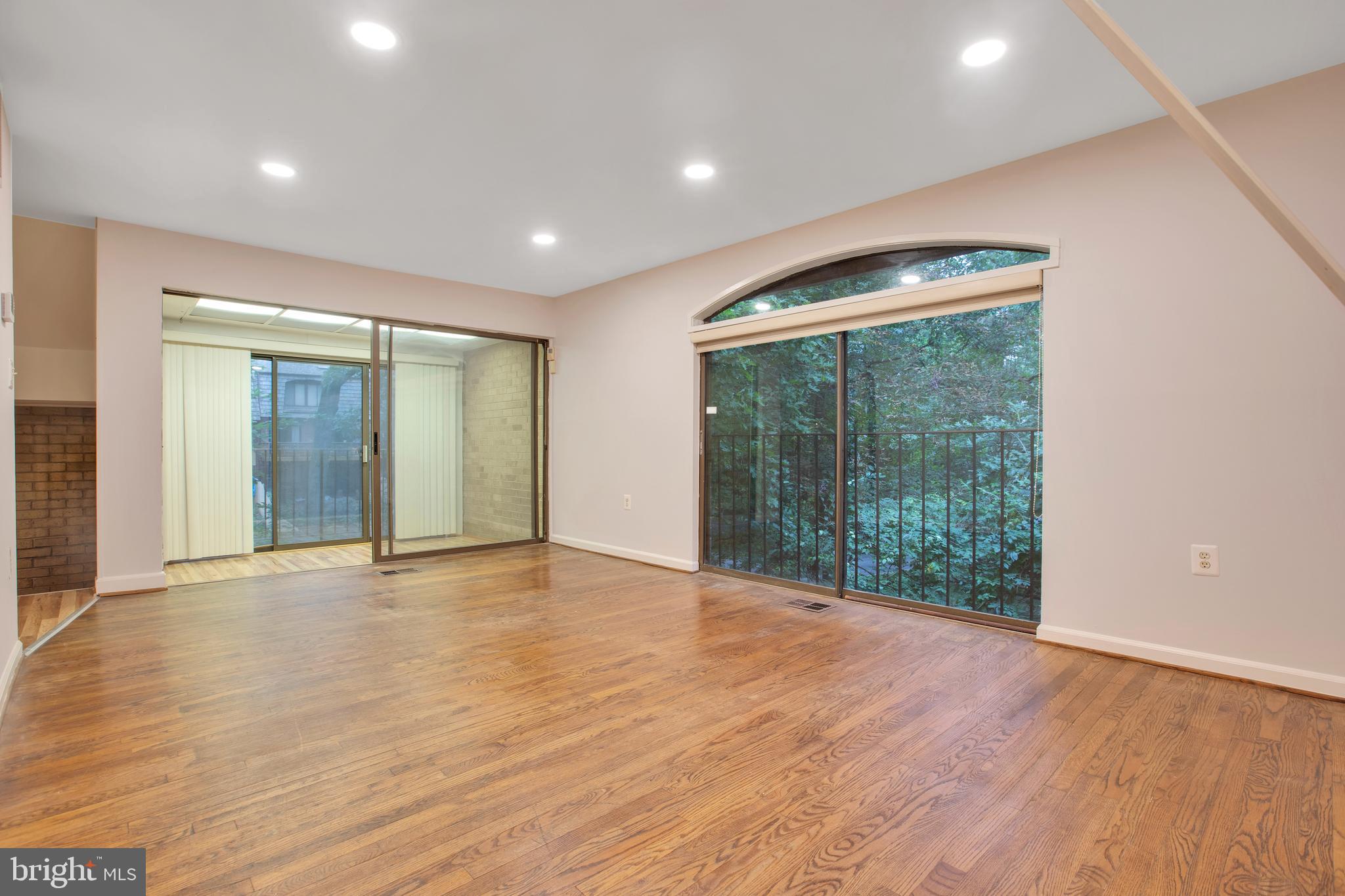 8014 Inverness Ridge Road Rockville, MD 20854 - Photo 5 of 35 Spacious living room w/refinished oak floors