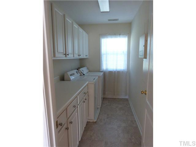 7500 Lagrange Drive Raleigh, NC 27613 - Photo 7 of 20 2nd floor laundry room with lot of cabinet space. Laundry Room