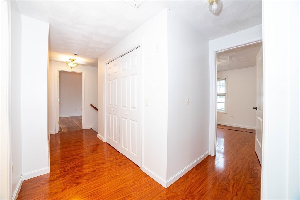 41 Mohave Road Worcester, MA 01606 - Photo 19 of 30 a view of a hallway with wooden floor