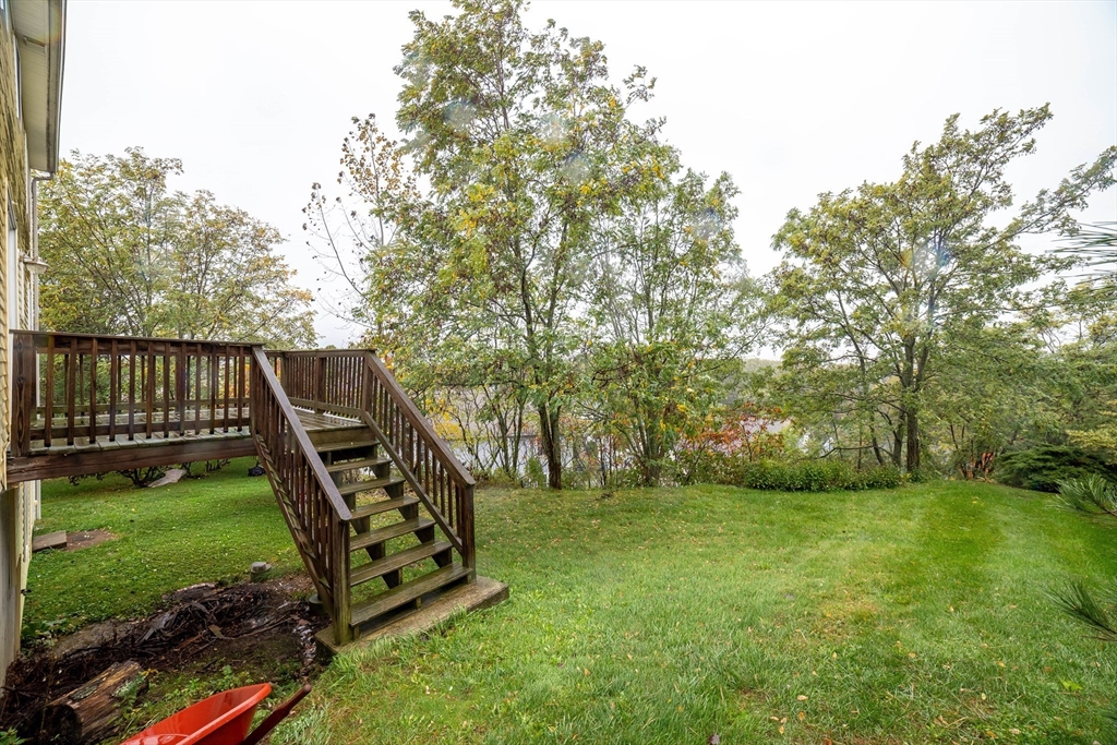 41 Mohave Road Worcester, MA 01606 - Photo 30 of 30 a view of a backyard with wooden fence
