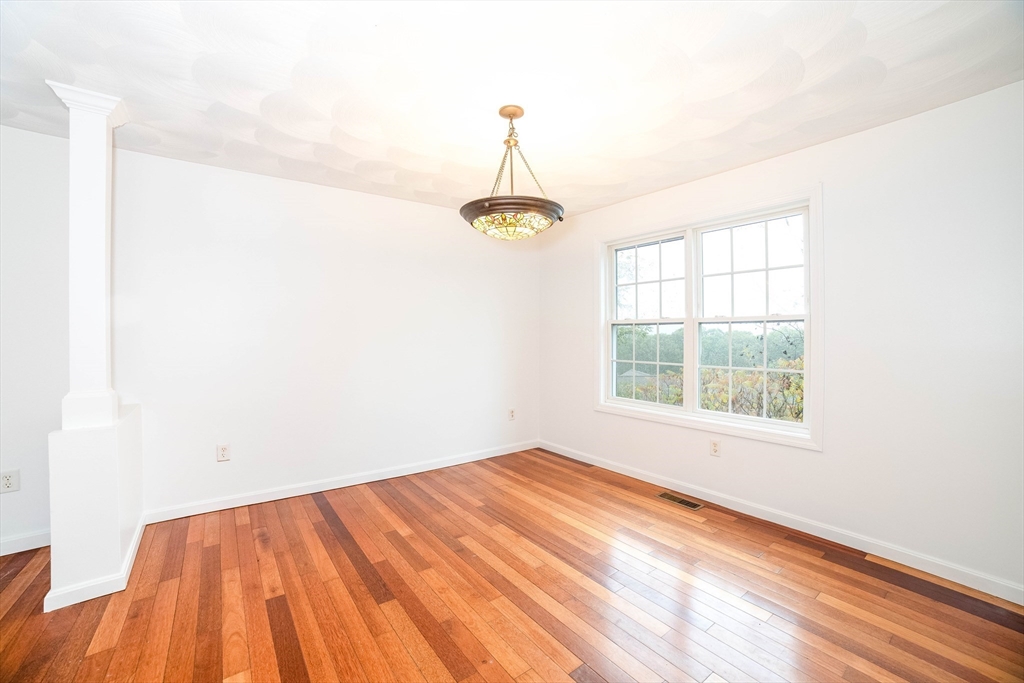 41 Mohave Road Worcester, MA 01606 - Photo 6 of 30 a view of empty room with wooden floor and fan