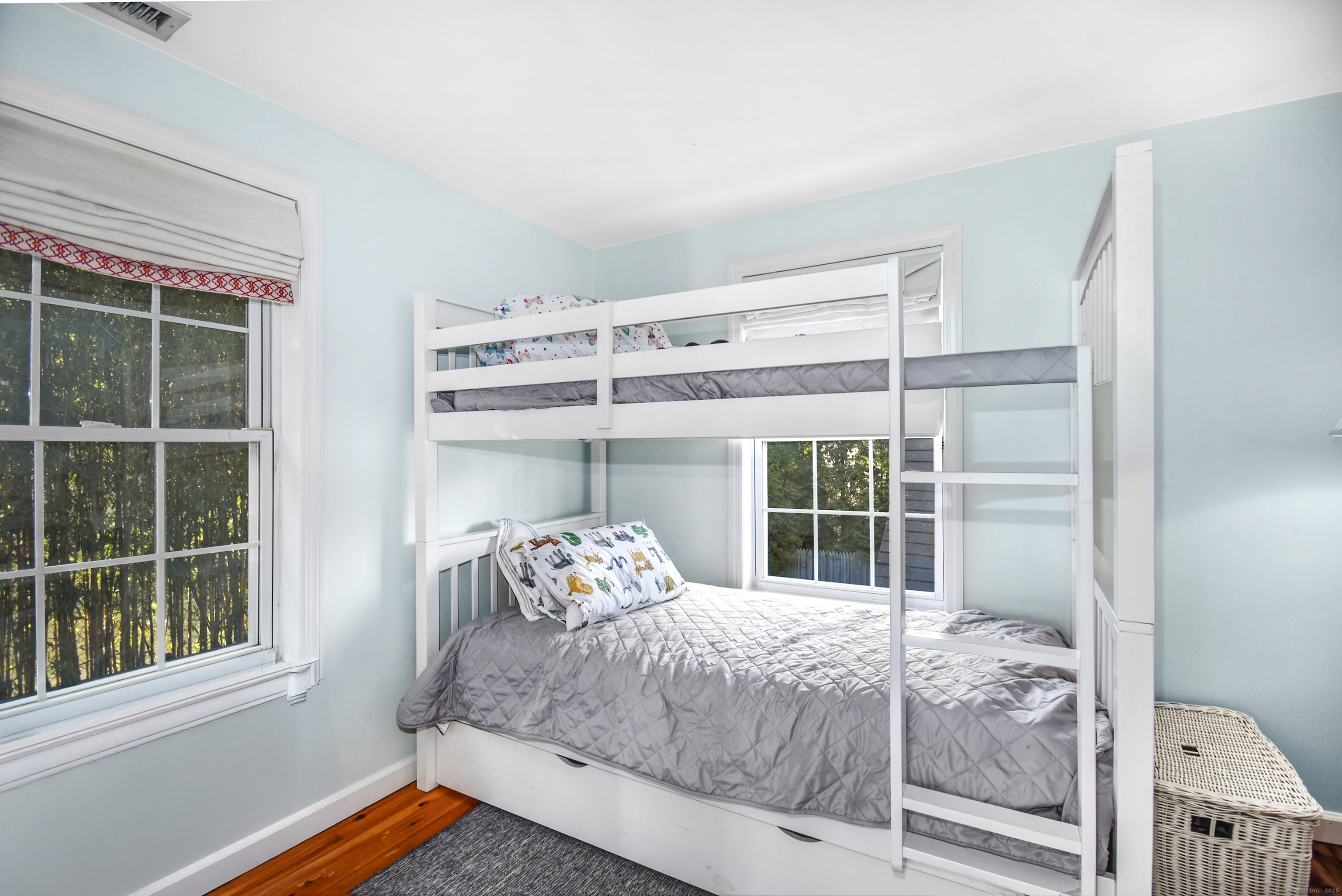 60 East Avenue New Canaan, CT 06840 - Photo 17 of 24 a bedroom with a bed and a window