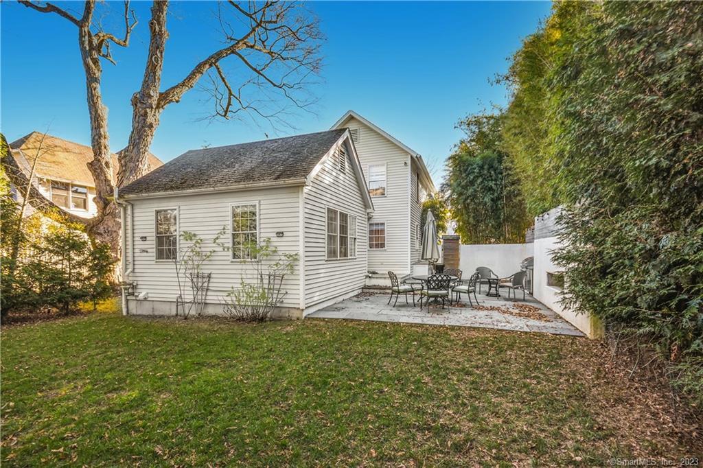 60 East Avenue New Canaan, CT 06840 - Photo 21 of 24 a view of house with backyard and sitting area