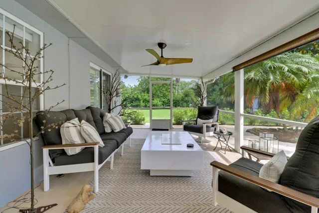 a view of a lake with houses in the background