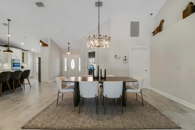 a living room with furniture fireplace and a flat screen tv