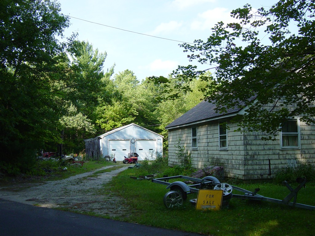 247 Stafford Road Monson, MA 01057 - Photo 3 of 3 a front view of a house with garden