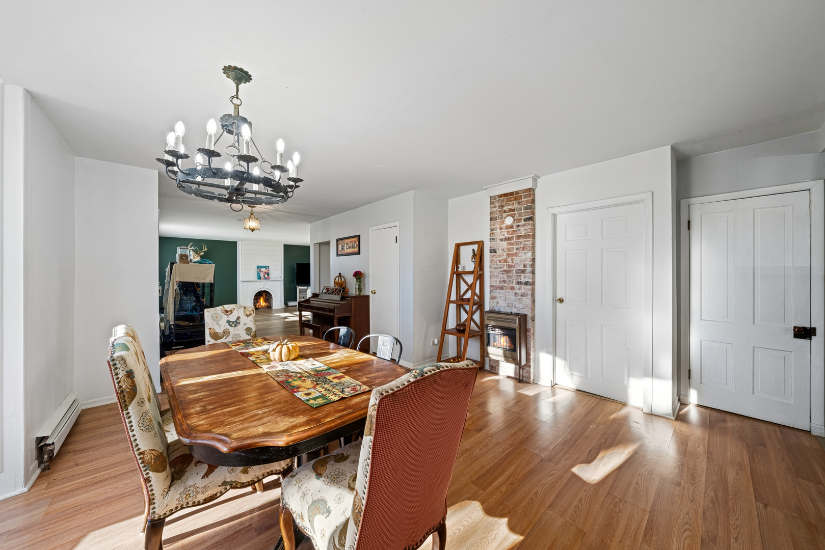 11071 Crimmin Road Newark, IL 60541 - Photo 14 of 44 a view of a dining room with furniture and wooden floor