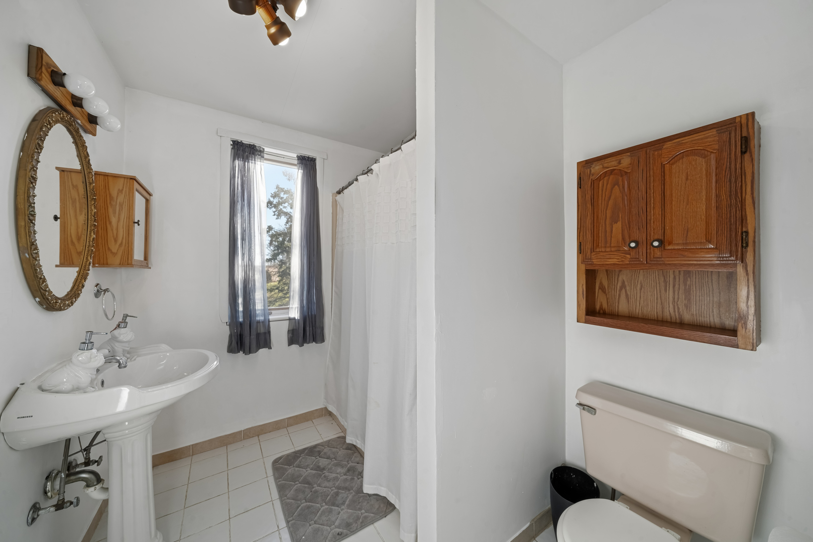 11071 Crimmin Road Newark, IL 60541 - Photo 22 of 44 a bathroom with a sink and a mirror
