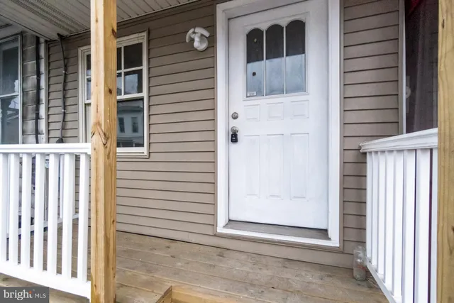 a view of front door and porch