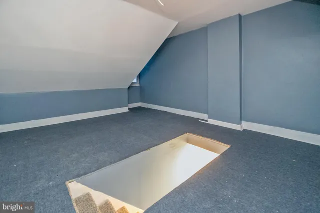 a view of a big room with wooden floor