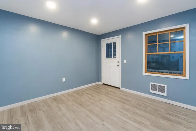 an empty room with windows