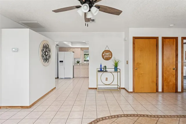 a view of a storage & utility room with a window