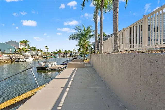 an aerial view of a house with a ocean view