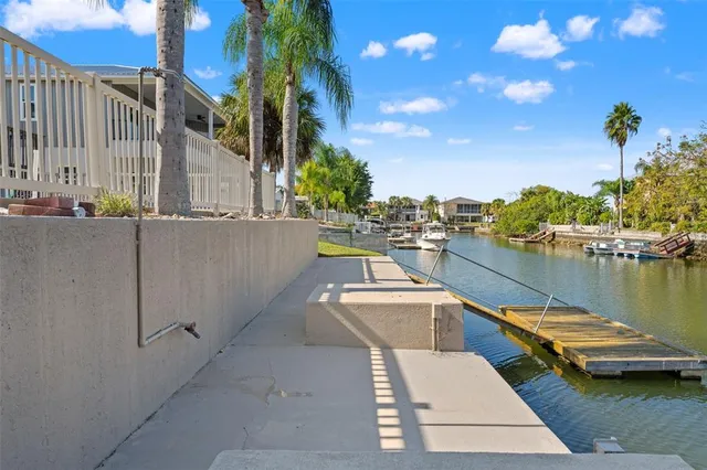 a view of balcony with wooden floor