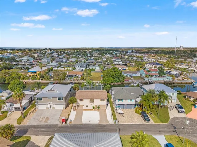 an aerial view of residential building with parking space