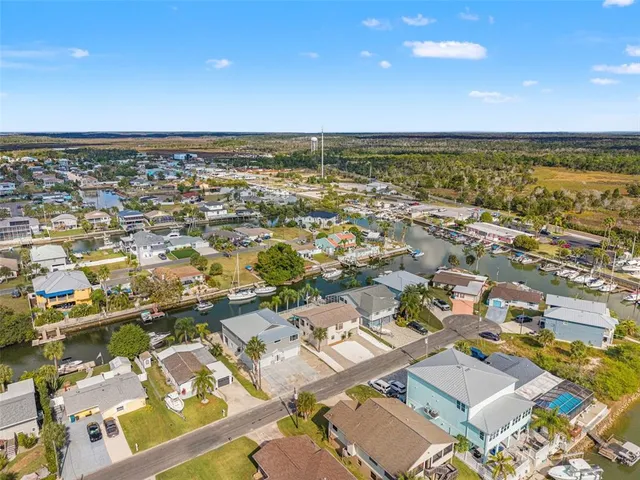 an aerial view of a city with parking