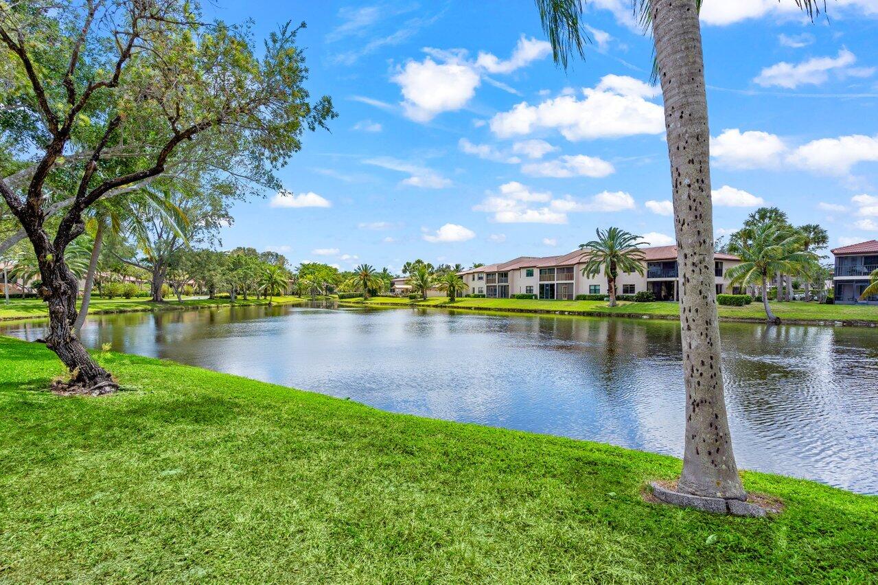 9261 Vista Del Lago, Unit H Boca Raton, FL 33428 - Photo 25 of 27 a lake view with a lake view