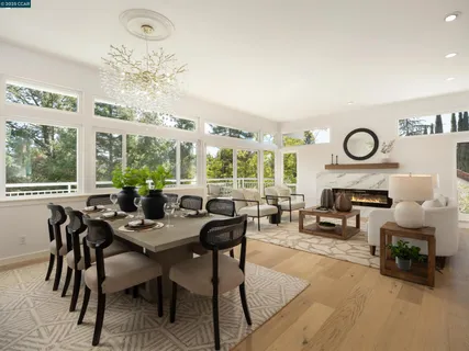 a view of a dining room with furniture window and outside view