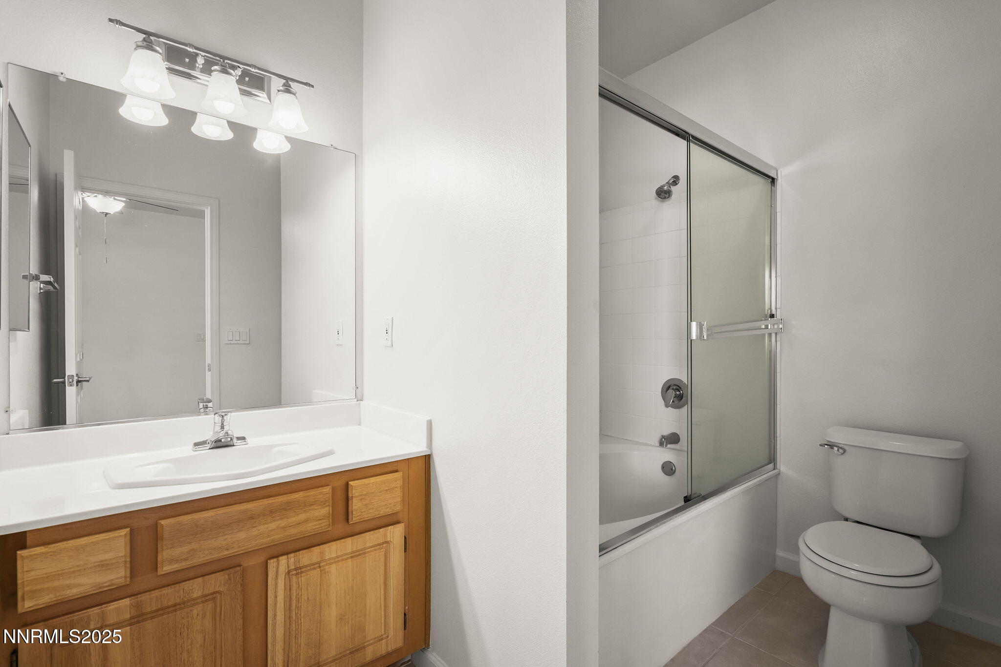 900 South Meadows Parkway, Unit 622 Reno, NV 89521 - Photo 16 of 30 a bathroom with a sink a toilet and shower