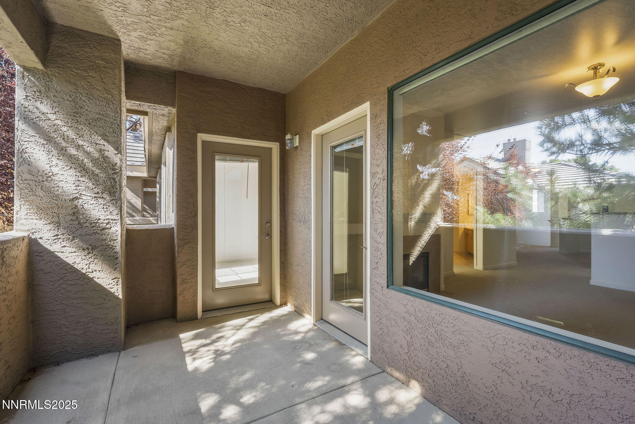 900 South Meadows Parkway, Unit 622 Reno, NV 89521 - Photo 22 of 30 a view of a glass door with a glass door