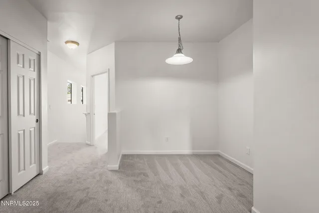 a view of empty room with a sink