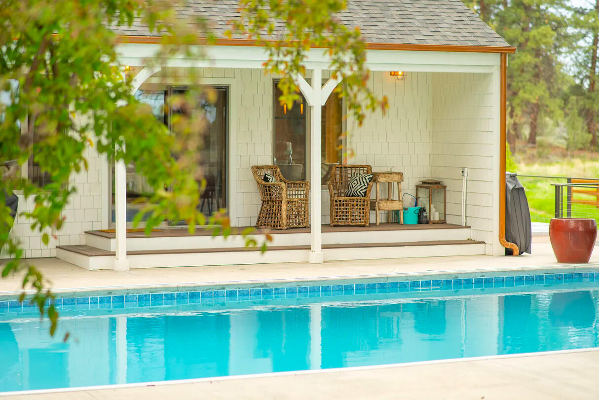 60359 Arnold Market Road Bend, OR 97702 - Photo 29 of 64 poolside now has additional lounge furniture and outdoor TV / speaker setup