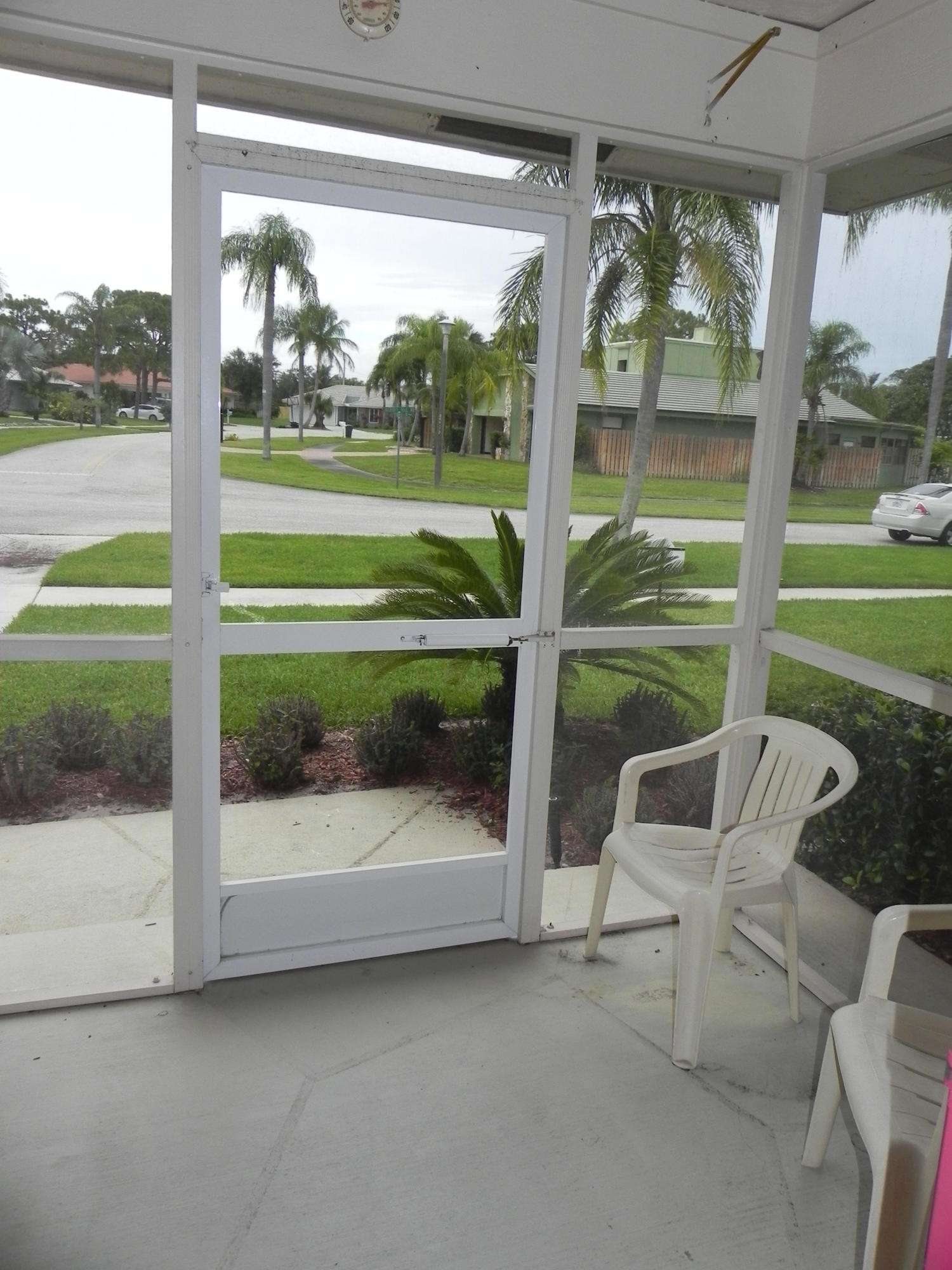 6 Hickory Hill Road Tequesta, FL 33469 - Photo 4 of 19 Front Screened Porch