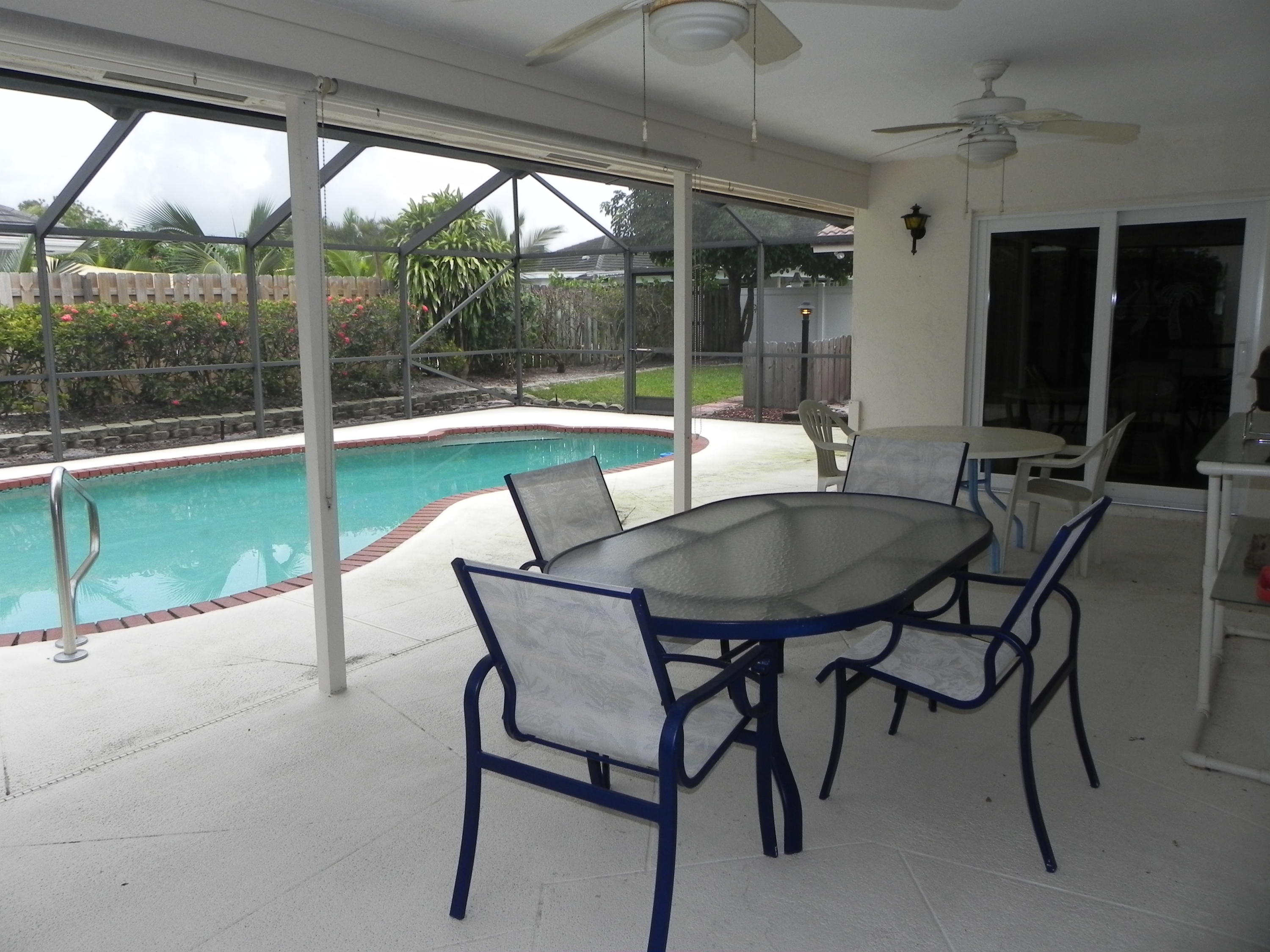 6 Hickory Hill Road Tequesta, FL 33469 - Photo 5 of 19 Covered Porch