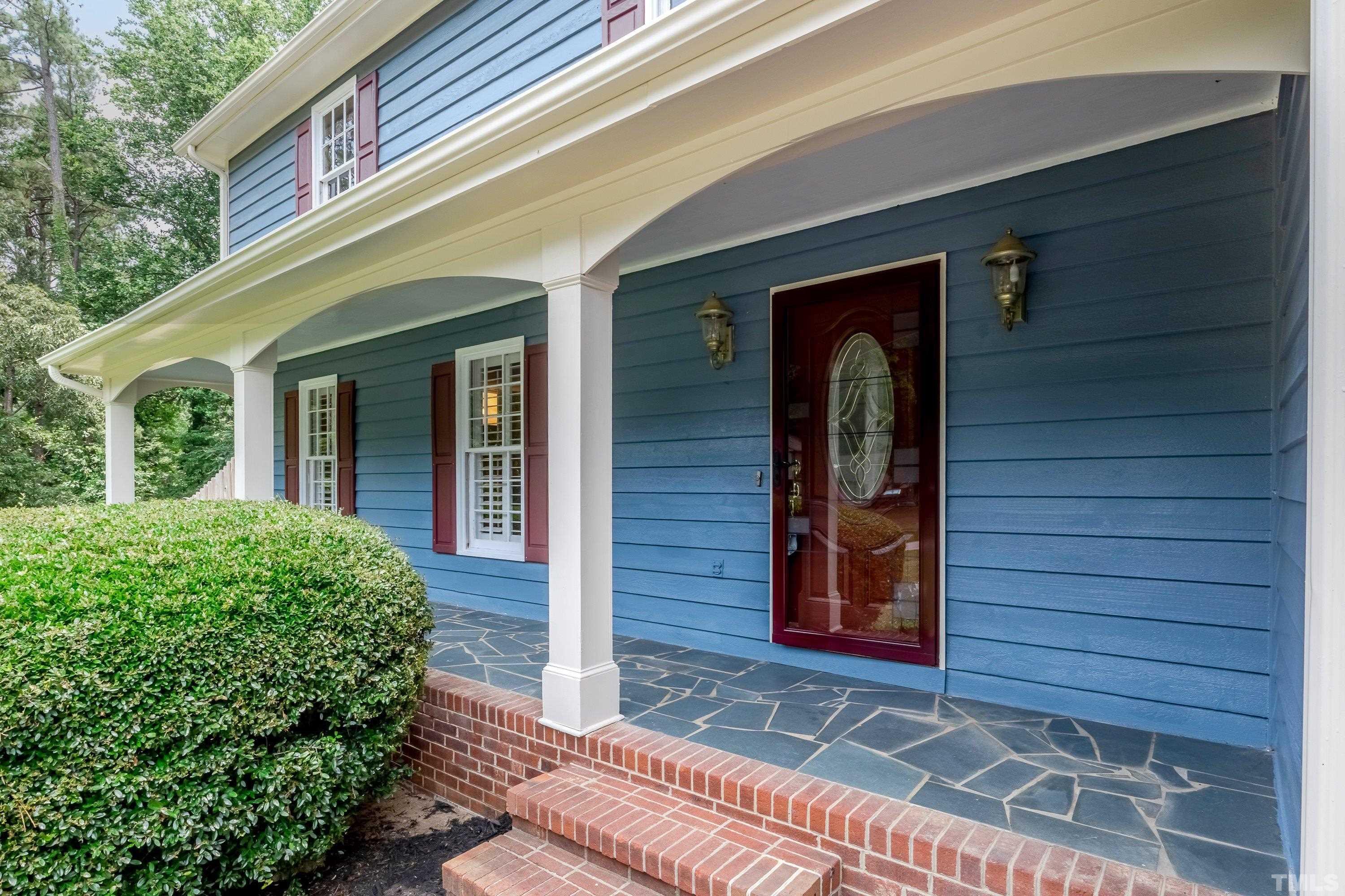 3108 Beane Drive Raleigh, NC 27604 - Photo 2 of 51 a front view of a house with a yard