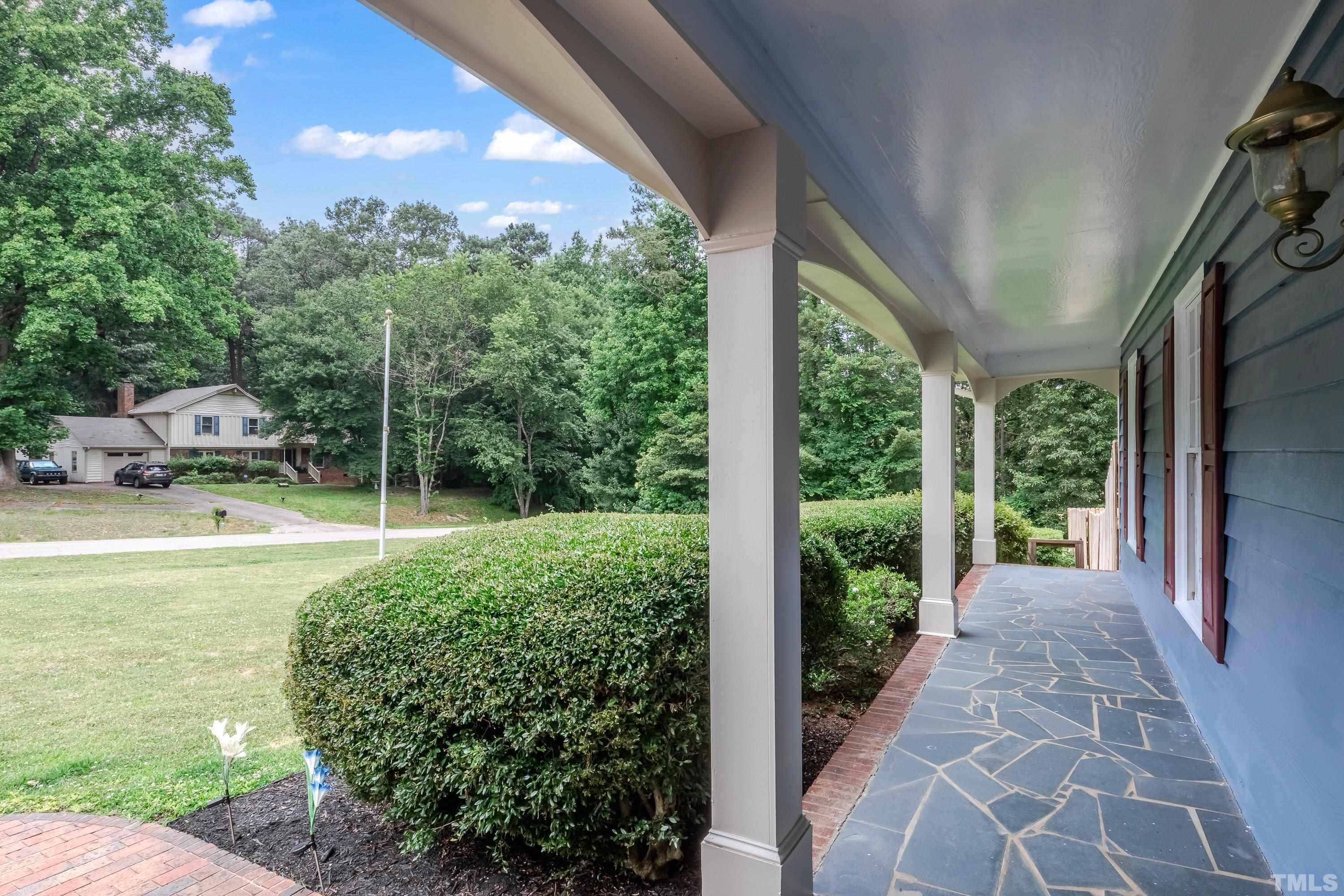 3108 Beane Drive Raleigh, NC 27604 - Photo 3 of 51 a view of a sitting area with swimming pool in front of it