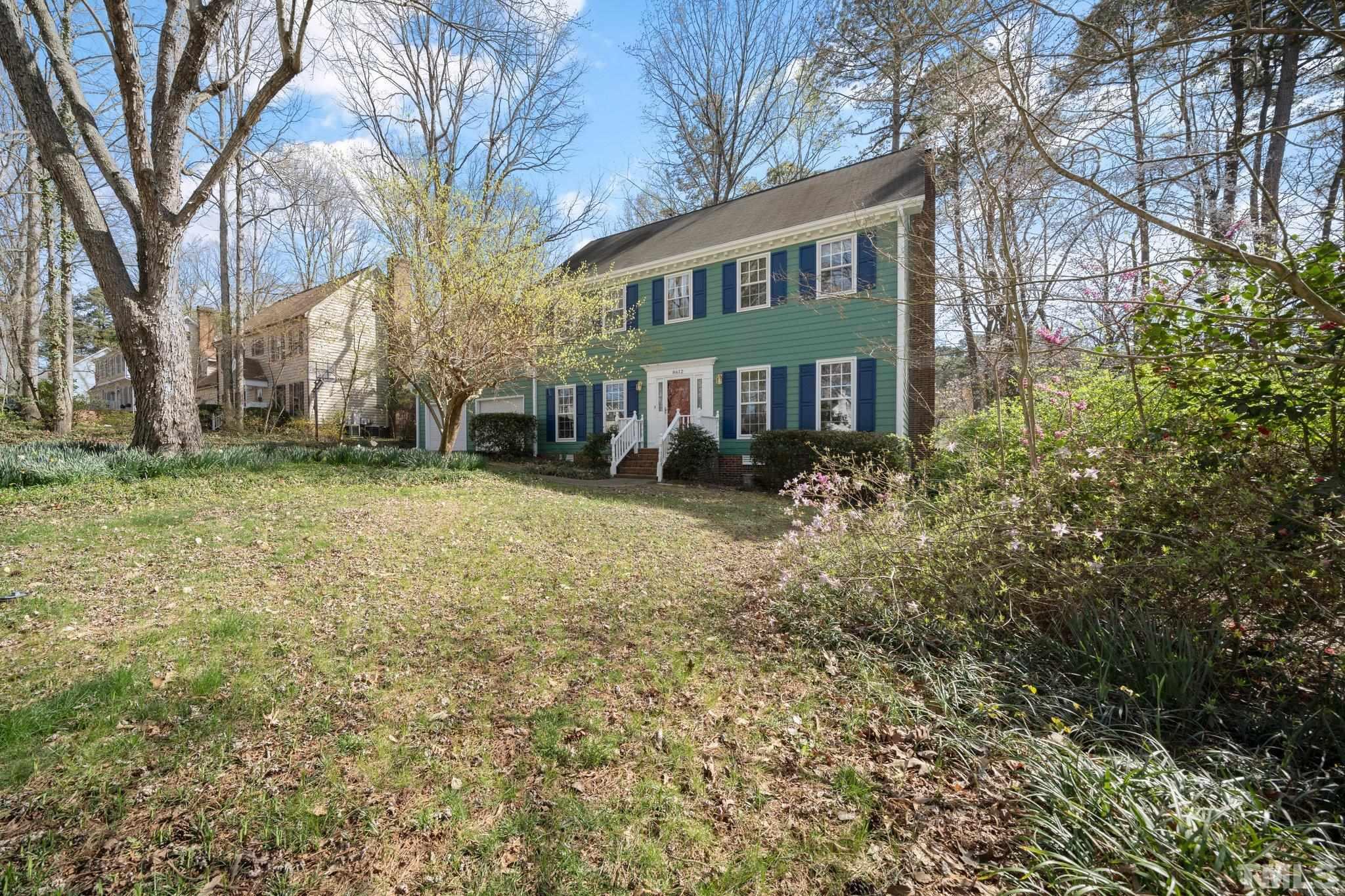 8612 Mourning Dove Road Raleigh, NC 27615 - Photo 29 of 29 a view of a house with a yard
