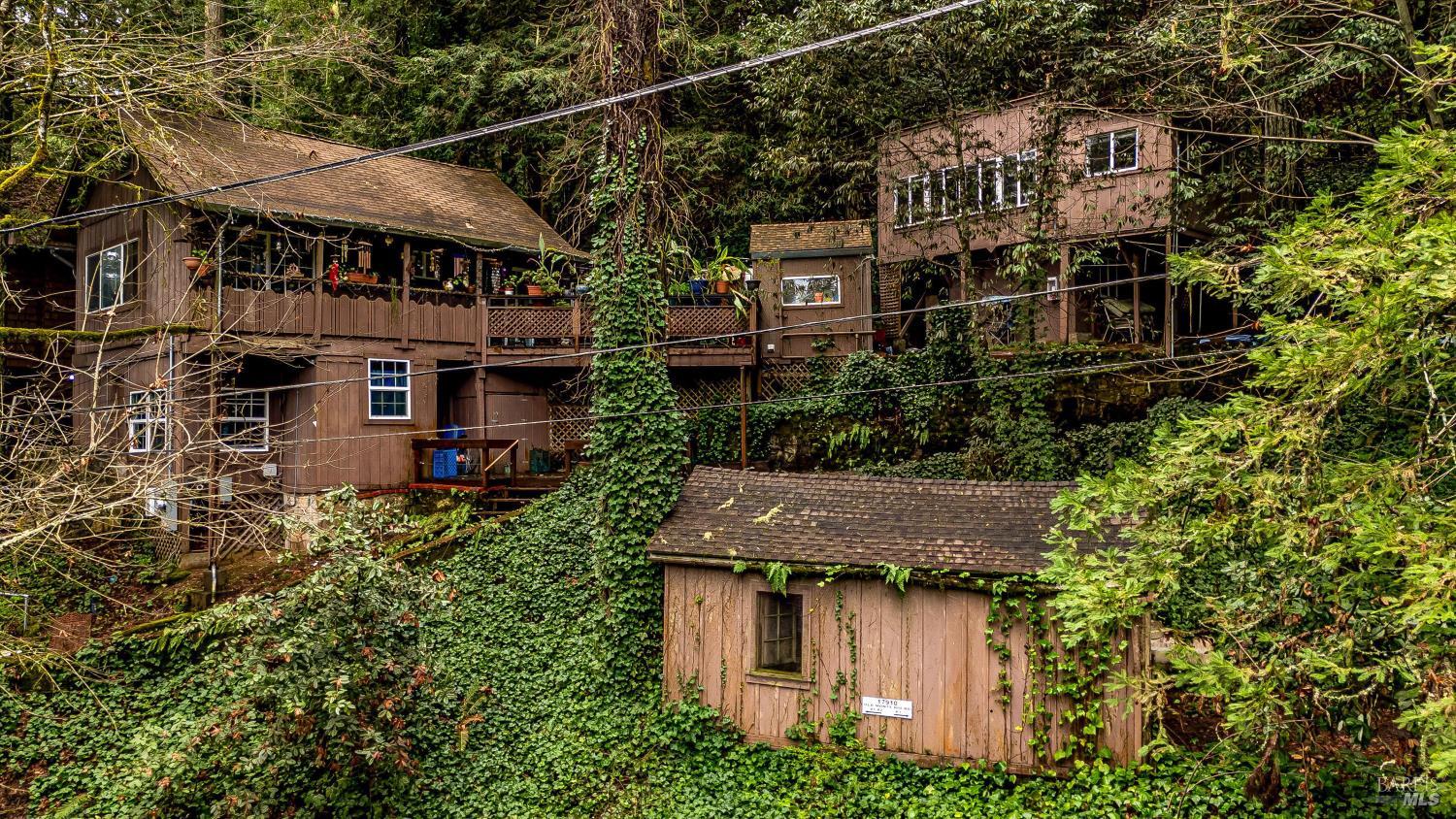 17910 Old Monte Rio Road Guerneville, CA 95446 - Photo 19 of 20 an aerial view of a house with a garden