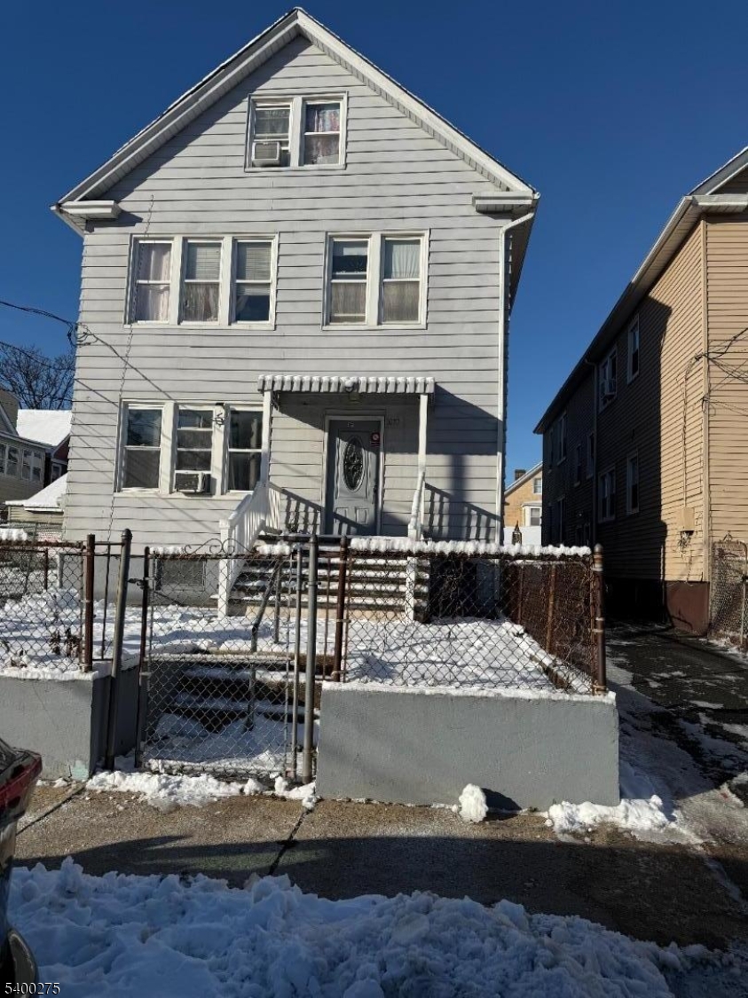 1010 Kilsyth Road Elizabeth, NJ 07208 - Photo 9 of 9 a front view of a house with a yard