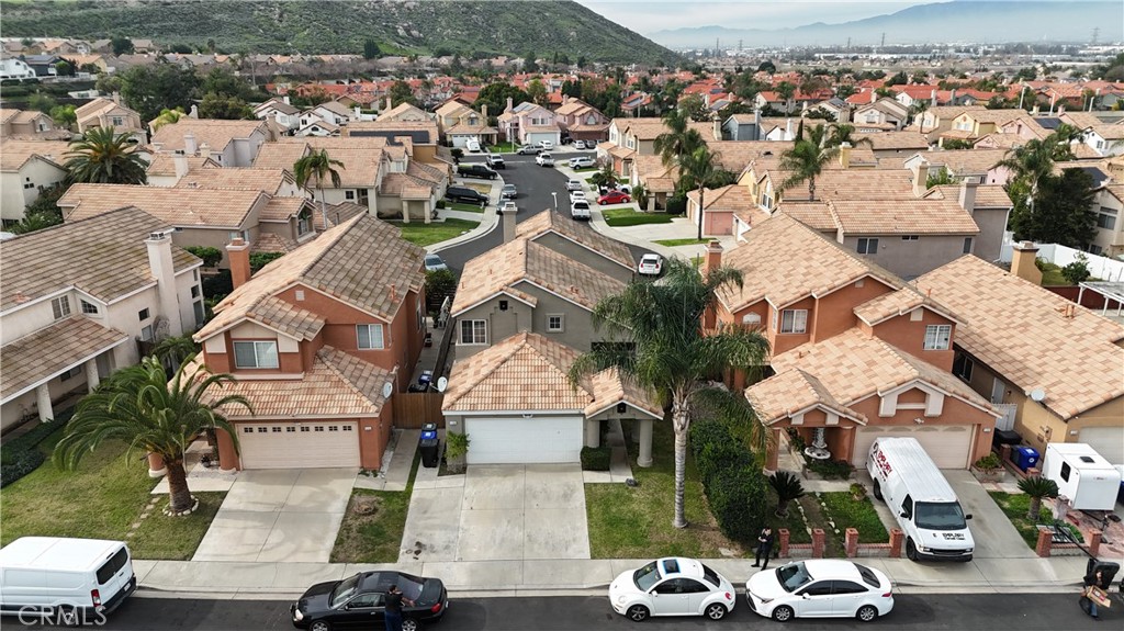 an aerial view of multiple houses with outdoor space
