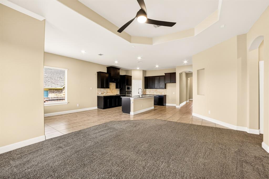 552 Winnetka Drive Oak Point, TX 75068 - Photo 21 of 40 a view of a kitchen with a sink and a refrigerator