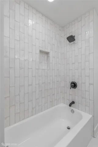 a bathroom with a bathtub