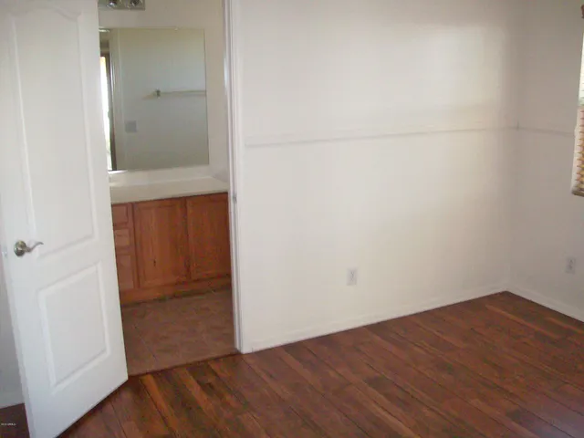 a bathroom with a toilet and a bathtub