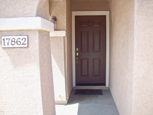 a view of a hallway with entryway