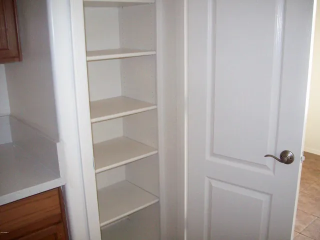 a view of an empty walk in closet