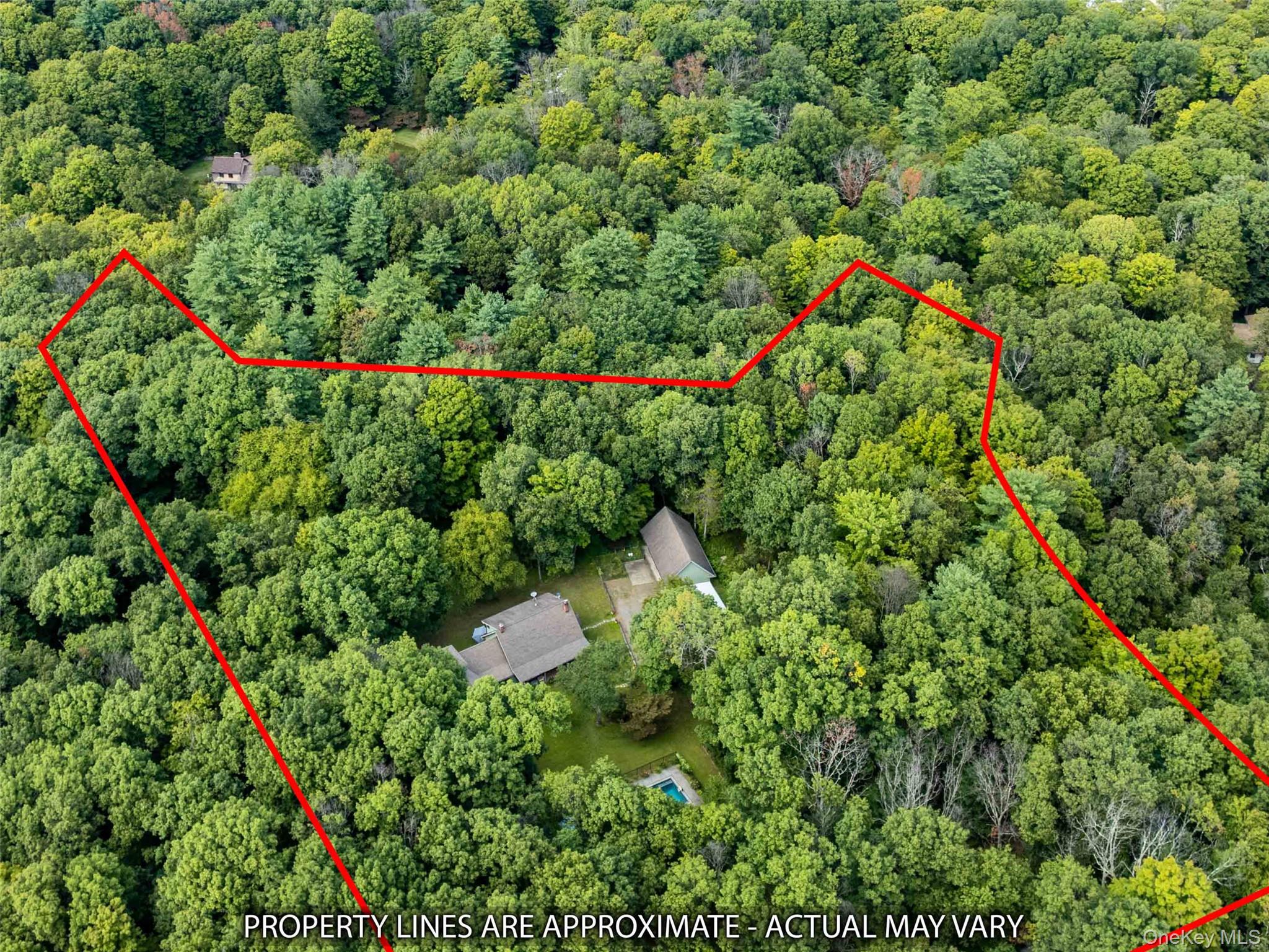74 Hilltop Road Rhinebeck, NY 12572 - Photo 38 of 40 Aerial view of property and surrounding area with property boundaries highlighted and a heavily wooded area
