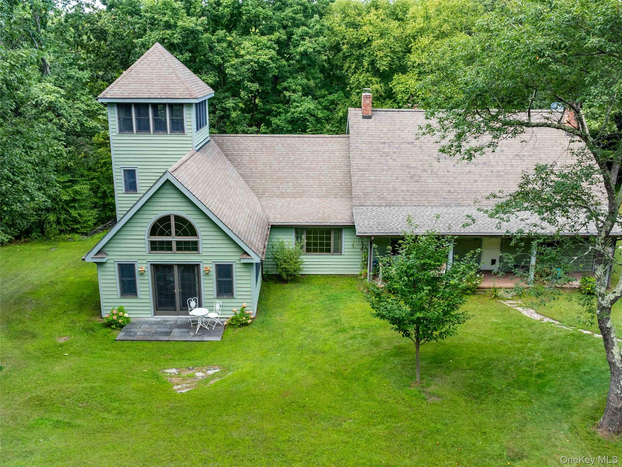 74 Hilltop Road Rhinebeck, NY 12572 - Photo 5 of 40 Rear view of property with roof with shingles, a yard, a patio area, and a chimney