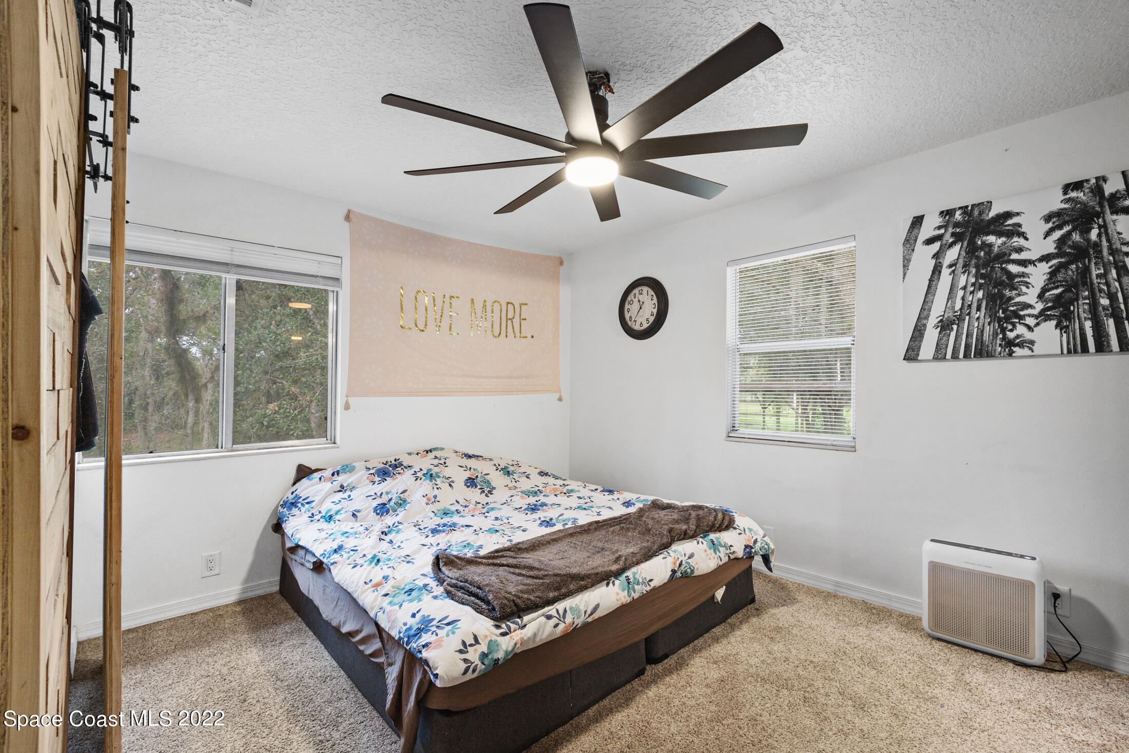5480 Citrus Boulevard Cocoa, FL 32926 - Photo 20 of 43 a bedroom with a bed and a window