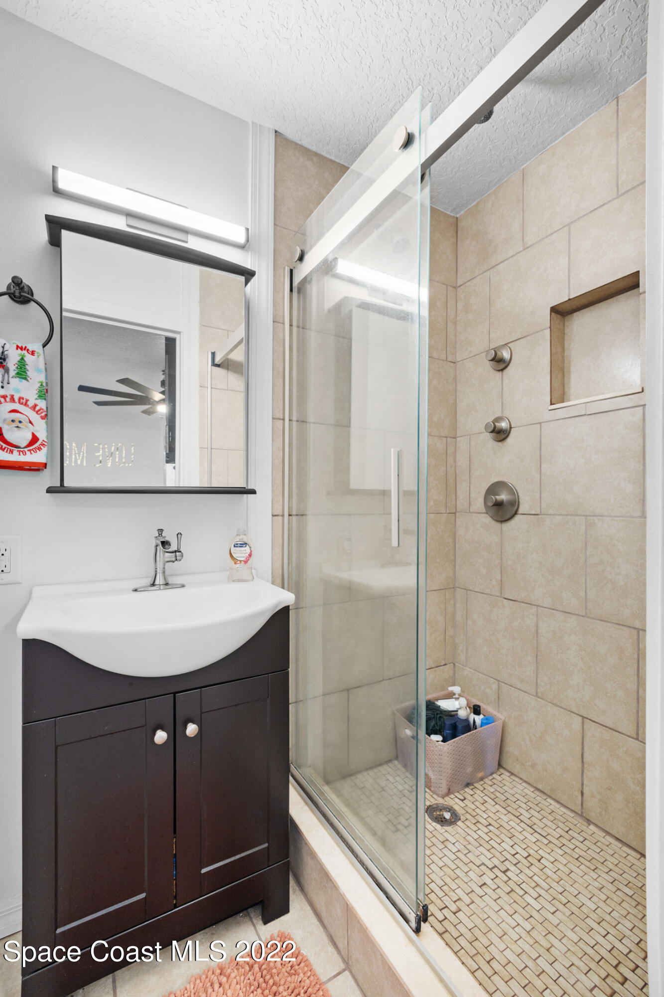 5480 Citrus Boulevard Cocoa, FL 32926 - Photo 22 of 43 a bathroom with a sink and a mirror