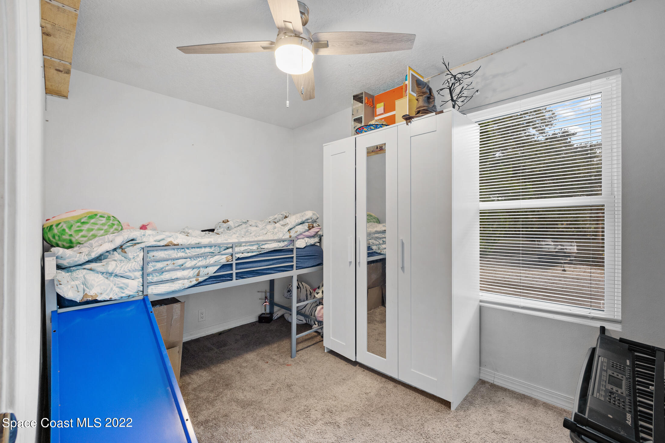 5480 Citrus Boulevard Cocoa, FL 32926 - Photo 29 of 43 a view of a workspace with furniture and a window
