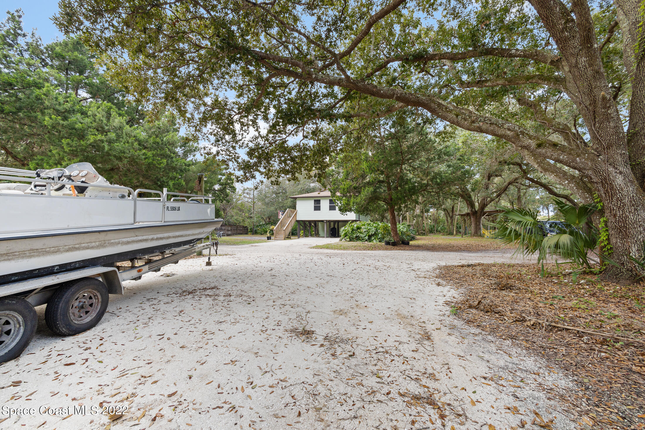 5480 Citrus Boulevard Cocoa, FL 32926 - Photo 33 of 43 a car parked in front of a house